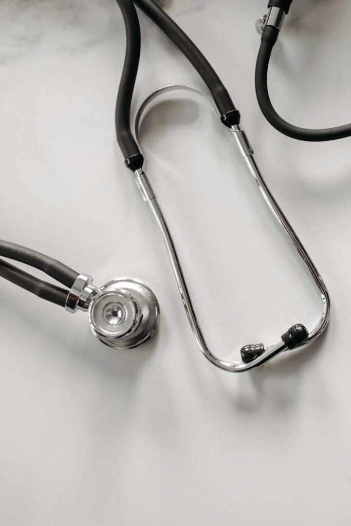 A detailed image of a stethoscope on a white background, ideal for healthcare themes.